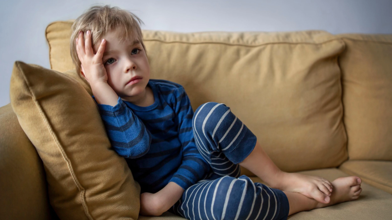 Child sitting on couch